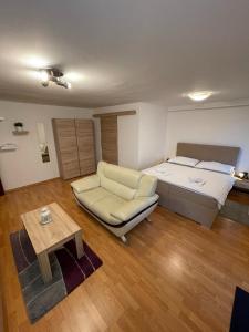 Postel nebo postele na pokoji v ubytování Apartmány Luhačovice
