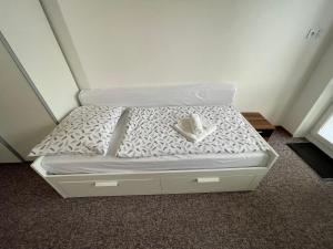 Postel nebo postele na pokoji v ubytování Apartmány Luhačovice