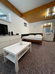 Postel nebo postele na pokoji v ubytování Apartmány Luhačovice