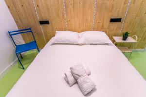 Postel nebo postele na pokoji v ubytování Koala Hostel Mercado