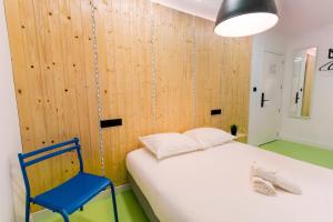 Postel nebo postele na pokoji v ubytování Koala Hostel Mercado