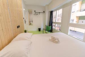 Postel nebo postele na pokoji v ubytování Koala Hostel Mercado