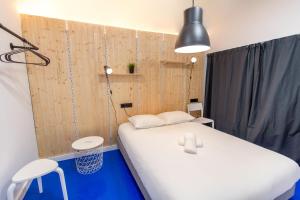 Postel nebo postele na pokoji v ubytování Koala Hostel Mercado