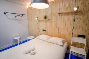 Postel nebo postele na pokoji v ubytování Koala Hostel Mercado