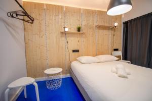 Postel nebo postele na pokoji v ubytování Koala Hostel Mercado
