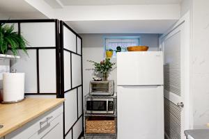 Photo de la galerie de l'établissement Downtown Retreat - Your Urban Oasis, à College Park