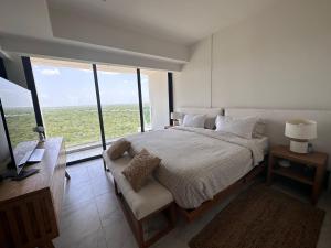 Postel nebo postele na pokoji v ubytování Luxury Penthouse in Cabo Norte