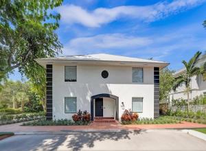 a white house with a black and white at Luxury Villa Nicole in Delray Beach