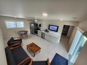 an aerial view of a living room with a kitchen at Sunshine Island Inn in Sanibel