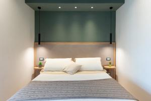 Posteľ alebo postele v izbe v ubytovaní B&B Amadema