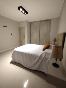 En eller flere senge i et værelse på Consorcio María Auxiliadora1H