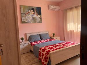 Ein Bett oder Betten in einem Zimmer der Unterkunft Villa spacieuse et agréable