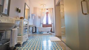 Koupelna v ubytování La Concordia - Boutique Hotel