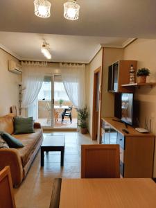 Гостиная зона в Apartamento Neptuno Sunrise Magic World