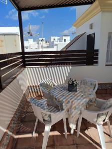 En balkon eller terrasse på Mina42 by 7Escalones