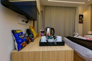 Letto o letti in una camera di Rizk Pyramids View Hotel