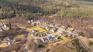 an aerial view of a small village on a hill at Snowmass Lodge - hot tub in Aviemore in Aviemore
