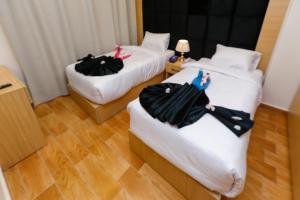 Letto o letti in una camera di Rizk Pyramids View Hotel