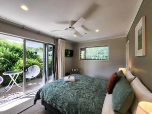 Ένα ή περισσότερα κρεβάτια σε δωμάτιο στο Hahei Getaway Rua