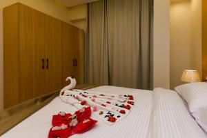 Letto o letti in una camera di Rizk Pyramids View Hotel