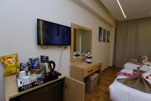 Letto o letti in una camera di Rizk Pyramids View Hotel
