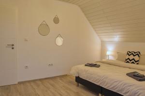 En eller flere senge i et værelse på No.4 by 21 Apartments