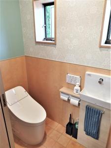 a bathroom with a toilet and a sink at Mitoyo - House - Vacation STAY 15144 in Mitoyo