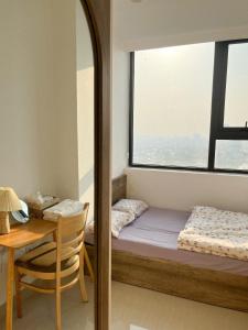 Will homestay, Nera Garden Huế tesisinde bir odada yatak veya yataklar