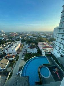 arial view of a city with a swimming pool at TOKAYOH D Khadijah in Kota Bharu