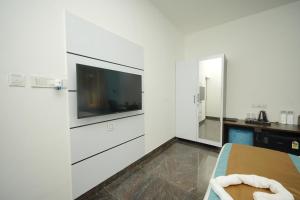 Kuchyň nebo kuchyňský kout v ubytování Bay Breeze Suites