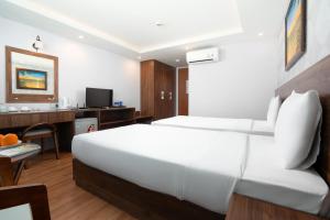 TV a/nebo společenská místnost v ubytování BIDV Beach Hotel Nha Trang