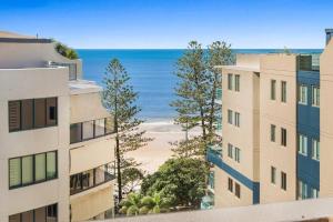 an apartment building with a view of the beach at Landmark Resort Private Apartment in Mooloolaba