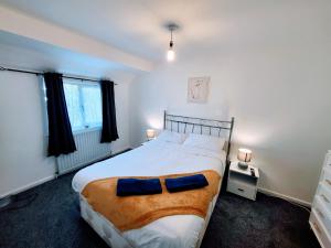 A bed or beds in a room at Stay Sleep Rest Heeley, Sheffield