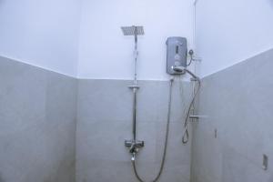 a shower in a bathroom with a shower at T20 Mirissa in Mirissa