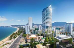 a view of a city with skyscrapers and the ocean at KA CAPITAL PANORAMA APARTMENT in Nha Trang