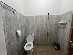 Koupelna v ubytování Wijaya Hostel