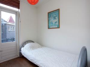 Katil atau katil-katil dalam bilik di Holiday home in the centre of Alkmaar