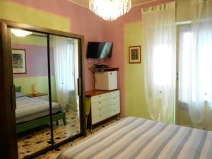 Postel nebo postele na pokoji v ubytování I Tetti Di Sassari B&B