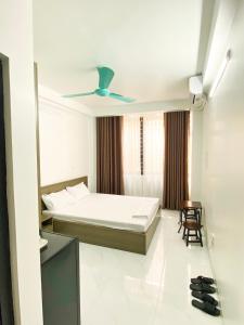 Vannas istaba naktsmītnē GRAD Minh Trang Motel