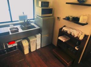 Een keuken of kitchenette bij Hashibaya TABI-NE
