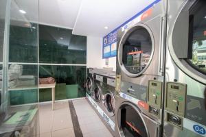 a washer and dryer in a store at Sun Inns Hotel Kota Laksamana Melaka in Malacca