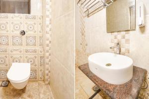 two pictures of a bathroom with a sink and a toilet at FabHotel Shirdi Park Inn in Shirdi