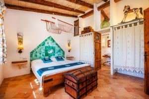 a bedroom with a bed in a room at La Paloma de Sa Torre Marina in Ses Covetes +31 photos