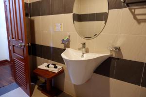 Koupelna v ubytování Kongmany Prestige Hotel