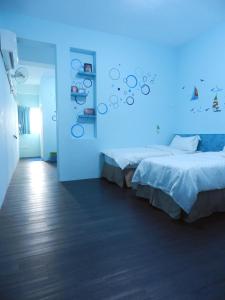 Postelja oz. postelje v sobi nastanitve Light Blue Hostel