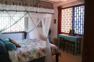 Posteľ alebo postele v izbe v ubytovaní Casa Kep Eco Homestay