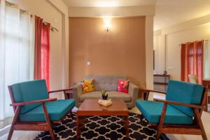 Treebo Vrindavan, 3 Km From Madikeri Fort的休息区