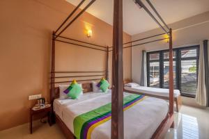 Treebo Vrindavan, 3 Km From Madikeri Fort客房内的一张或多张床位