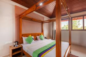 Treebo Vrindavan, 3 Km From Madikeri Fort客房内的一张或多张床位
