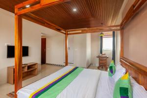 Treebo Vrindavan, 3 Km From Madikeri Fort客房内的一张或多张床位
